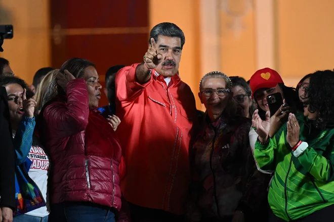 Nicolás Maduro je na tokratnih volitvah zmagal po svoje, z večjo prednostjo kot kdaj prej. FOTO: Federico Parra/AFP