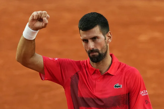 Novak Đokovic se je veselil zmage. FOTO: Dimitar Dilkoff/AFP