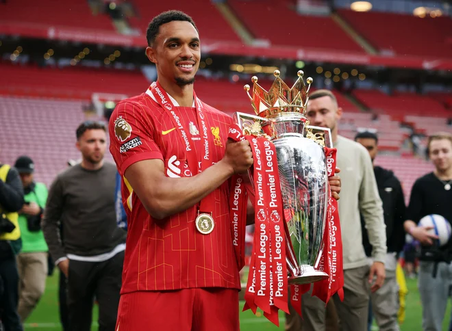 Trent Alexander-Arnold bo po Liverpoolu zdaj lovorike osvajal z Real Madridom. FOTO: Phil Noble/Reuters