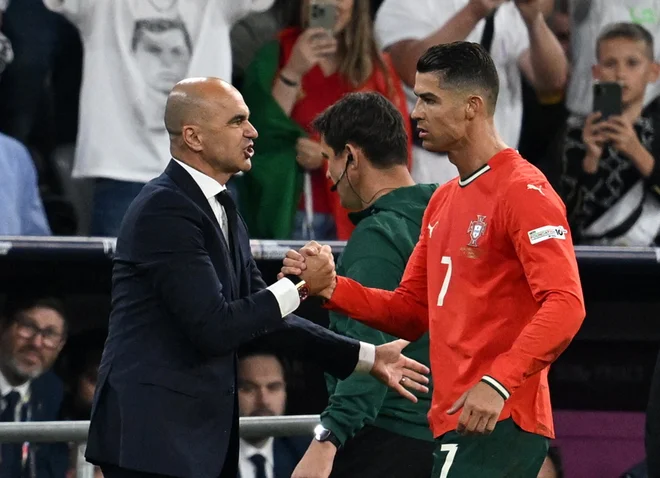 Portugalski selektor Roberto Martinez še vedno stavi na veterana Cristiana Ronalda. FOTO: Angelika Warmuth/Reuters