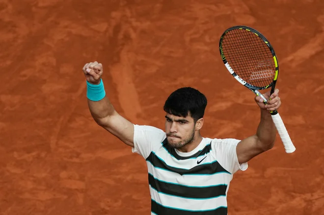 Španec Carlos Alcaraz je zmagovalec letošnjega odprtega prvenstva Francije v tenisu v Roland Garrosu. FOTO: Dimitar Dilkoff/AFP