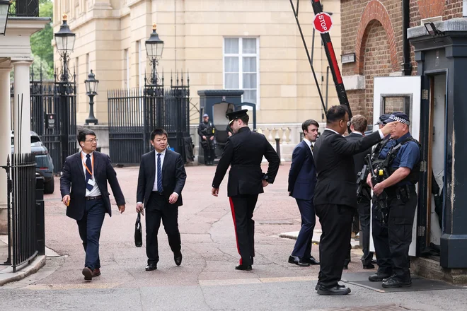 Pogajanja med ameriško in kitajsko delegacijo so se iz Ženeve preselila v London. FOTO: Toby Melville/Reuters