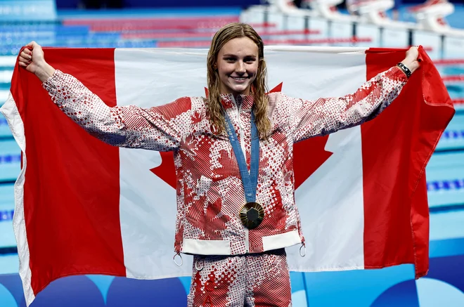 Summer McIntosh je na OI v Parizu osvojila tri zlate kolajne. FOTO: Clodagh Kilcoyne/Reuters