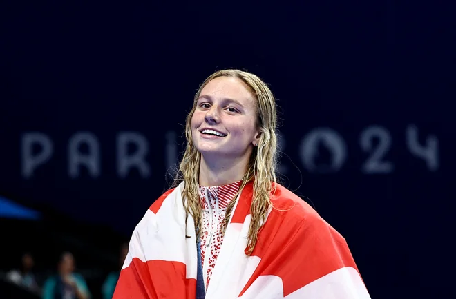 Summer McIntosh je postavila rekordne čase tudi na 400 m prosto in 200 m mešano. FOTO: Evgenia Novozhenina/Reuters