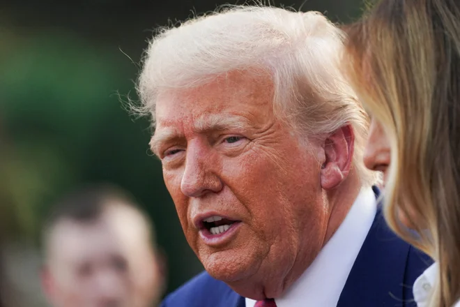 Trump trdil, da je njegova administracija zavezana diplomaciji z Iranom, vendar je priznal, da je za izraelske napade vnaprej. FOTO:Nathan Howard Reuters
