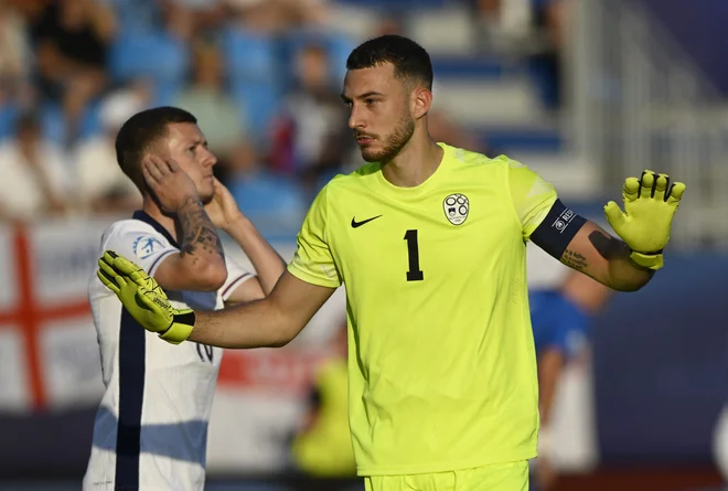 Slovenski vratar Martin Turk je prikazal odlično predstavo. FOTO: Radovan Stoklasa/Reuters