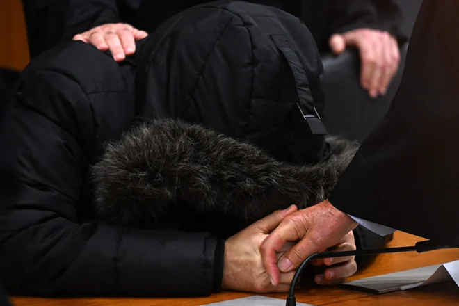 Obtožnica je 40-letnika bremenila dveh smrti in osmih primerov hudega mučenja. FOTO: Kirill Kudryavtsev/AFP