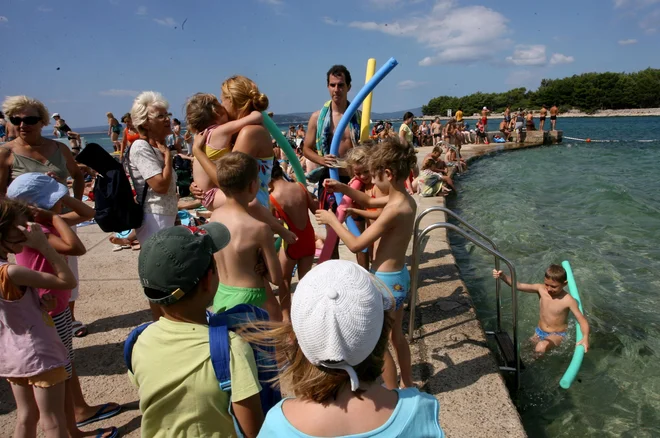 Da smo država z najmanj otroki, ki živijo v revščini v Evropski uniji, je gotovo tudi dediščina socializma. FOTO: Ljubo Vukelič
