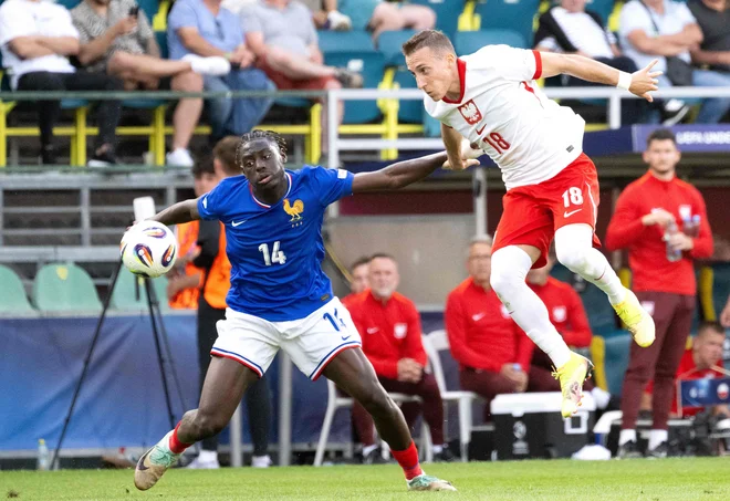Pred francoskimi nogometaši je danes zahtevna preizkušnja z Dansko. FOTO: Joe Klamar/AFP