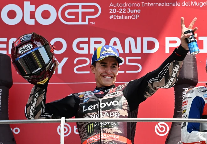 Marc Marquez se je veselil nove zmage. FOTO: Jennifer Lorenzini/ Reuters