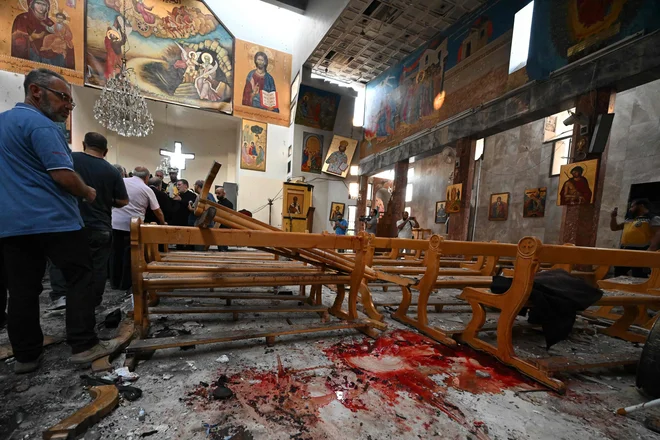 Napad se je zgodil v času, ko si nova sirska vlada prizadeva pridobiti podporo verskih manjšin. FOTO: Louai Beshara/AFP