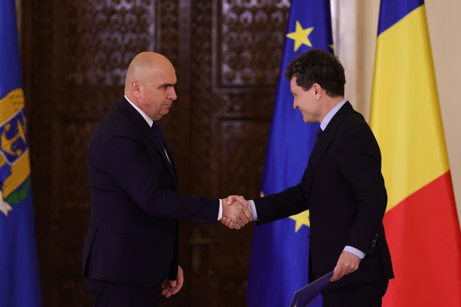 Ilie Bolojan in predsednik Romunije Nicușor Dan. FOTO: Octav Ganea/Inaquam Photos via Reuters