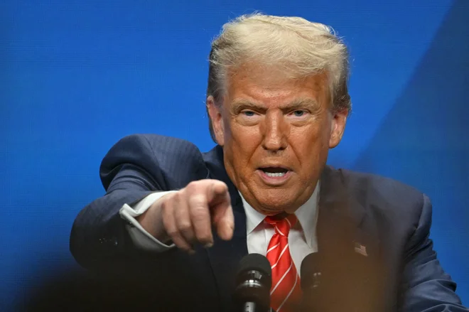 Predsednik ZDA Donald Trump je iz Haaga odšel zadovoljen. FOTO: Nicolas Tucat/AFP