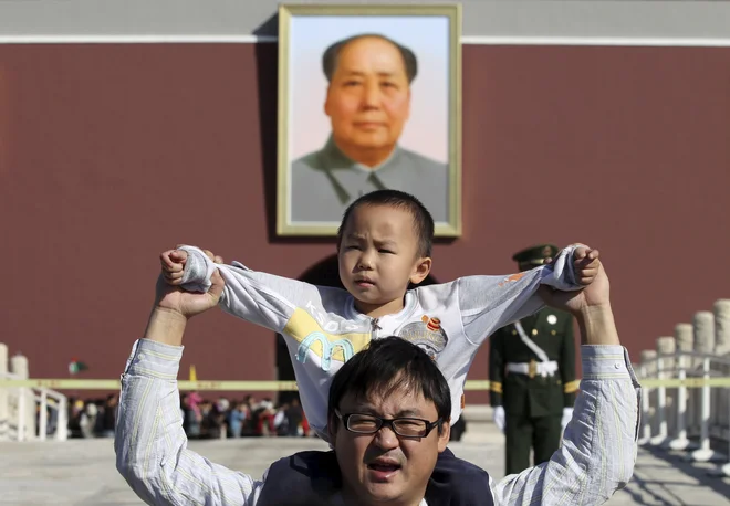 Oče, en otrok, Mao FOTO: Reuters