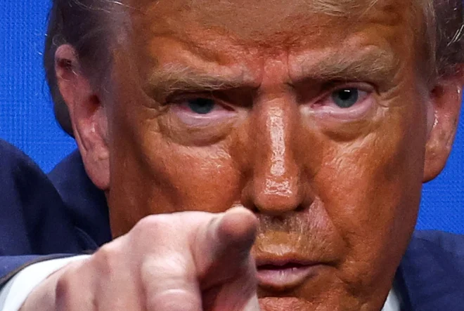 Predsednik ZDA Donald Trump, gospod pet odstotkov FOTO: Yves Herman/Reuters