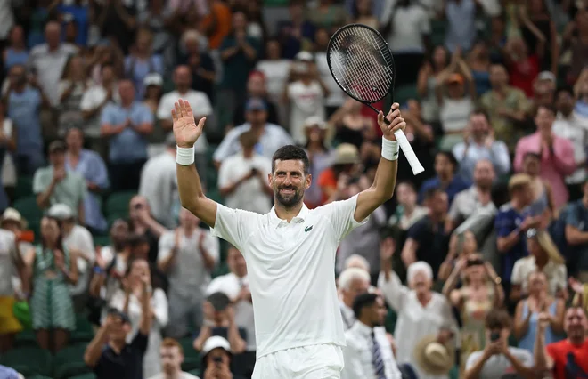 Sedemkratni zmagovalec Wimbledona Novak Djokovic. FOTO: Toby Melville/Reuters