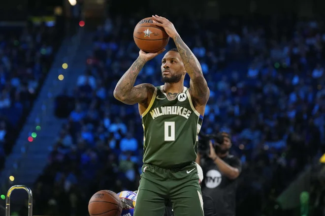 Lillard je v karieri NBA doslej odigral natanko 900 tekem v rednem delu. FOTO: Kyle Terada/Reuters Con