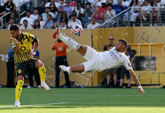 Kylian Mbappe je dosegel spektakularen gol proti Borussii. FOTO: Vincent Carchietta/Reuters