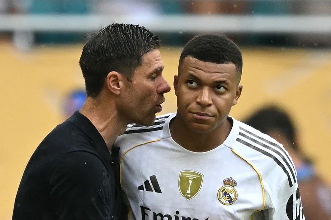 Xabi Alonso in Kylian Mbappe sta dobro začela zgodbo. FOTO: Chandan Khanna/AFP