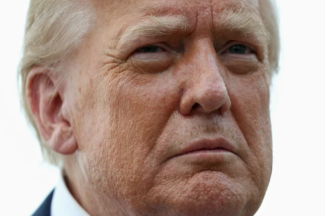 Dokument je pripravila Trumpova lastna administracija. FOTO: Kevin Lamarque/Reuters