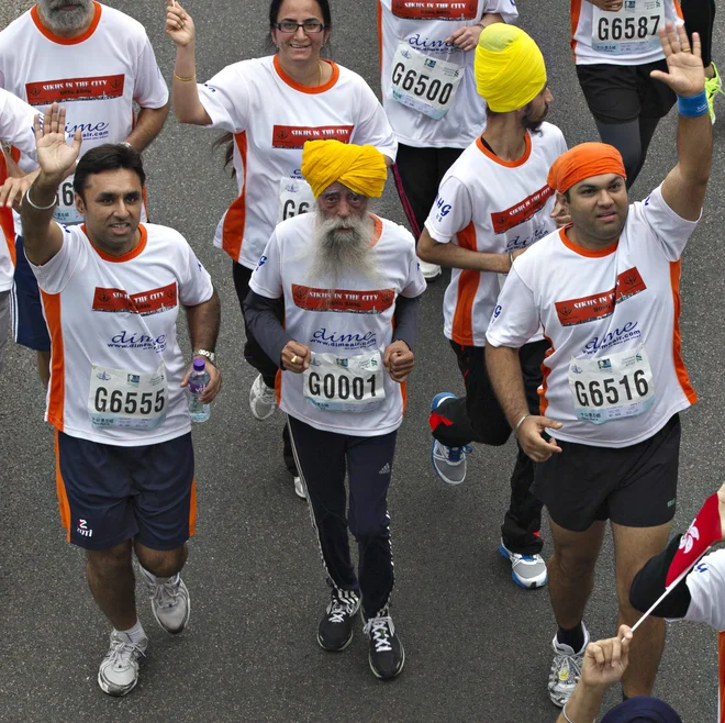 Pri 101 letu je pretekel 10 kilometrov na maratonu v Hongkongu. FOTO: Tyrone Siu/Reuters