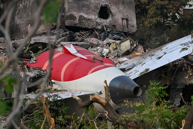 Letalo je bilo pred nesrečo v zraku manj kot eno minuto. FOTO: Punit Paranjpe/Afp