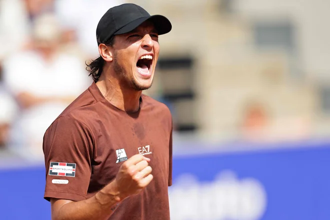 Luciano Darderi je na seznamu Italijanov zmagovalcev teniškega turnija v Umagu nasledil št. 1 na lestvici ATP Jannika Sinnerja. FOTO: Bjorn Larsson Rosvall/AFP