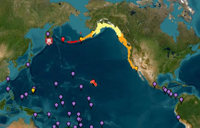 Slika sistema za opozarjanje pred cunamijem Nacionalne uprave za oceane in atmosfero (NOAA), ki prikazuje opozorila o cunamiju (rdeča), obvestila (oranžna), čakanje (rumena) in grožnje (vijolična) po potresu. FOTO: AFP