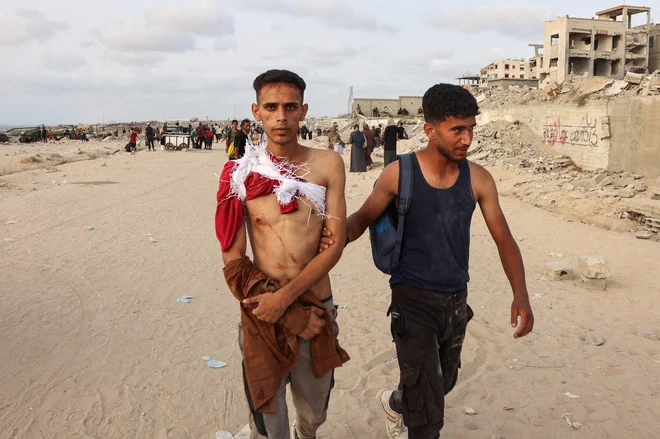 Nemčija je za dostave iz zraka v Jordanijo poslala dve vojaški transportni letali. FOTO: Omar Al-qattaa/Afp