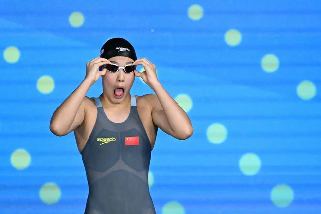 Zidi Yu je spisala novo poglavje v zgodovini plavanja. FOTO: Oli Scarff/AFP