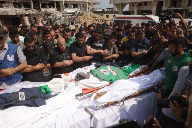 Žalovanje za novinarji FOTO: Bashar Taleb/AFP