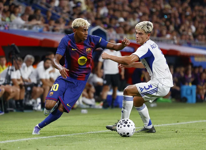 Lamina Yamala si želijo videti tudi v Miamiju, kjer že igra nekdanja legenda Barce Lionel Messi. FOTO: Bruna Casas/Reuters