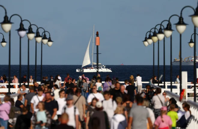 Lastniki podjetij branijo sporne nakupe jaht in solarijev, medtem ko se politični pritisk na vlado Donalda Tuska stopnjuje. FOTO: Kacper Pempel/Reuters